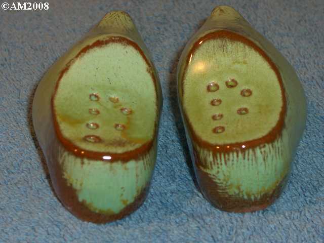 Dutch shoe shakers glazed prairie green.